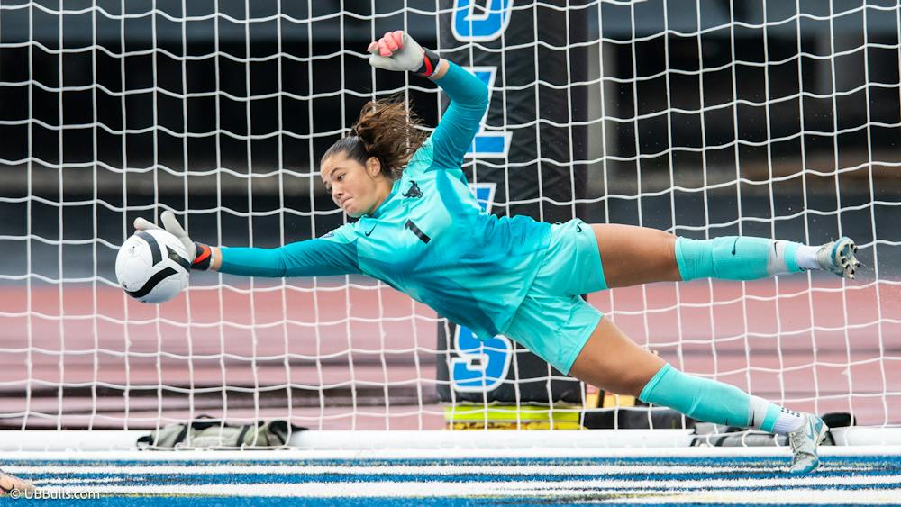 While the players in front of her can spend an entire match constantly involved in the action, UB women's soccer goalkeeper Lexie Thompson must remain focused for the one shot that could be the difference between winning a game, or losing one. 
