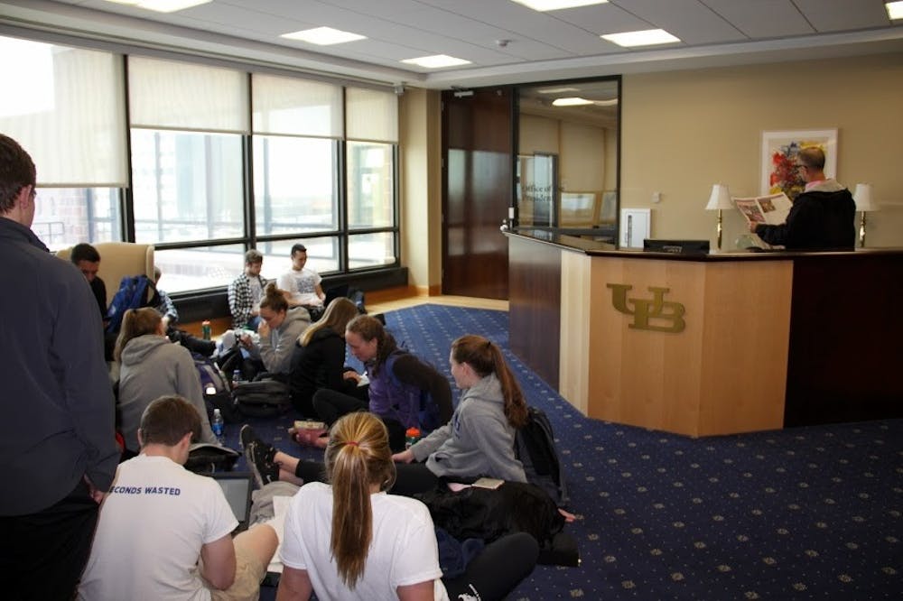 <p>Members of UB's swimming and diving program held a sit-in outside President Tripathi's office Monday.&nbsp;</p>