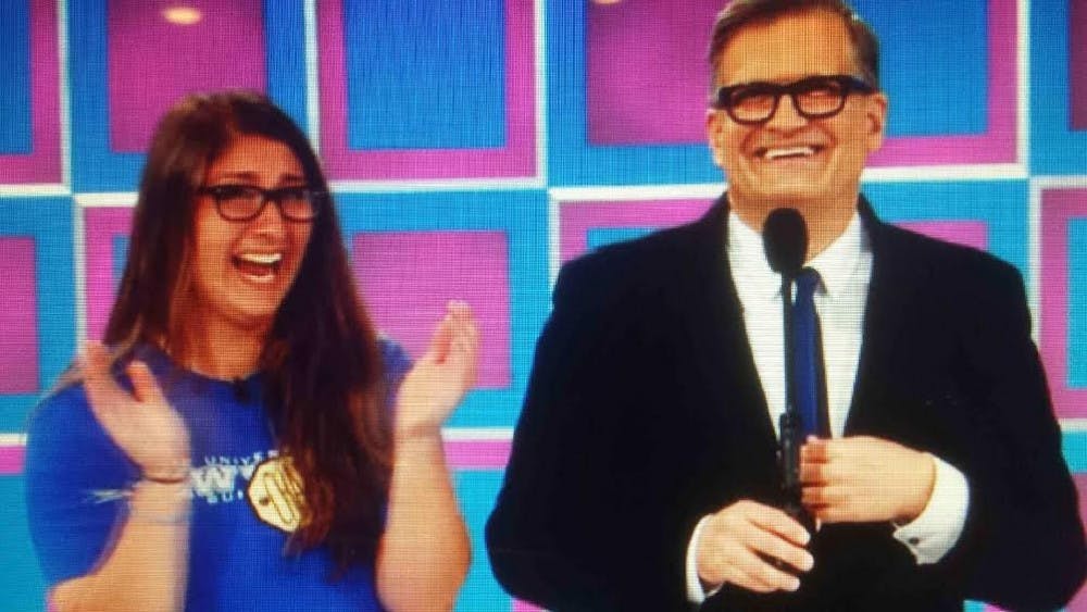 <p>Freshman pitcher Charlotte Miller appears on <em>The Price is Right </em>alongside host Drew Carey in a taping of the show from March that aired this past Friday. </p>
