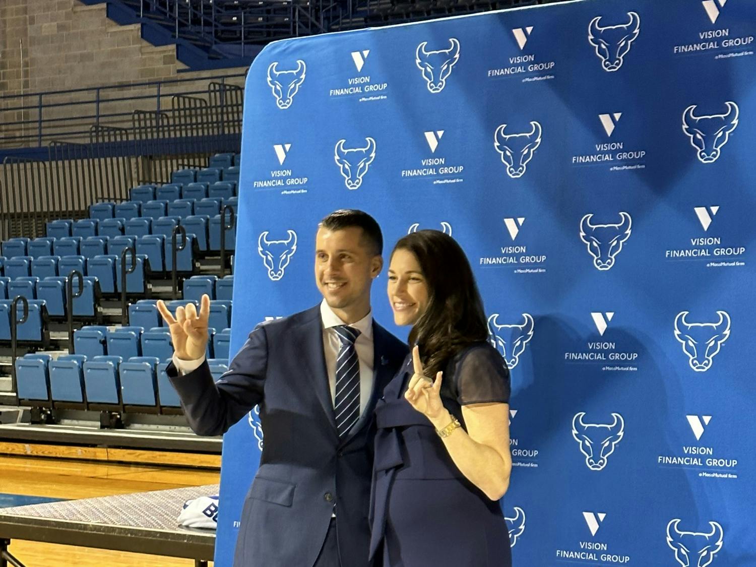 George Halcovage and his wife Lizzy pose for photos at Halcovage's introductory press conference on Monday.