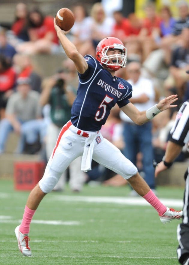 Sophomore quarterback Dillon Buechel threw for 2,569 yards and 14 touchdowns for the Dukes last season as a freshman. The Bulls and Duquesne face off Saturday at 3:30 p.m.&nbsp;Courtesy of Dave DeNoma