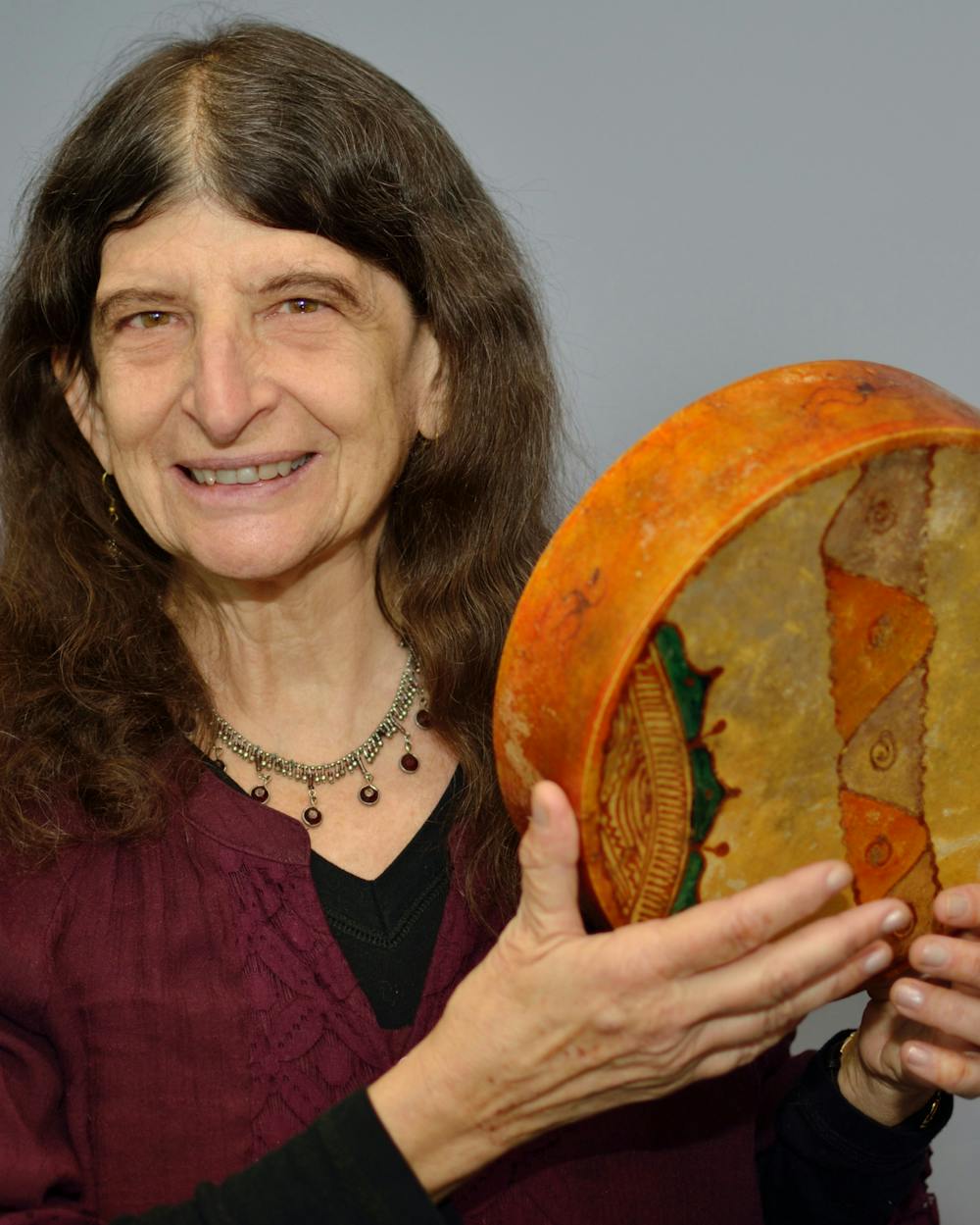 <p>Judith Cohen poses with her instrument. | Courtesy of Judith Cohen.</p>