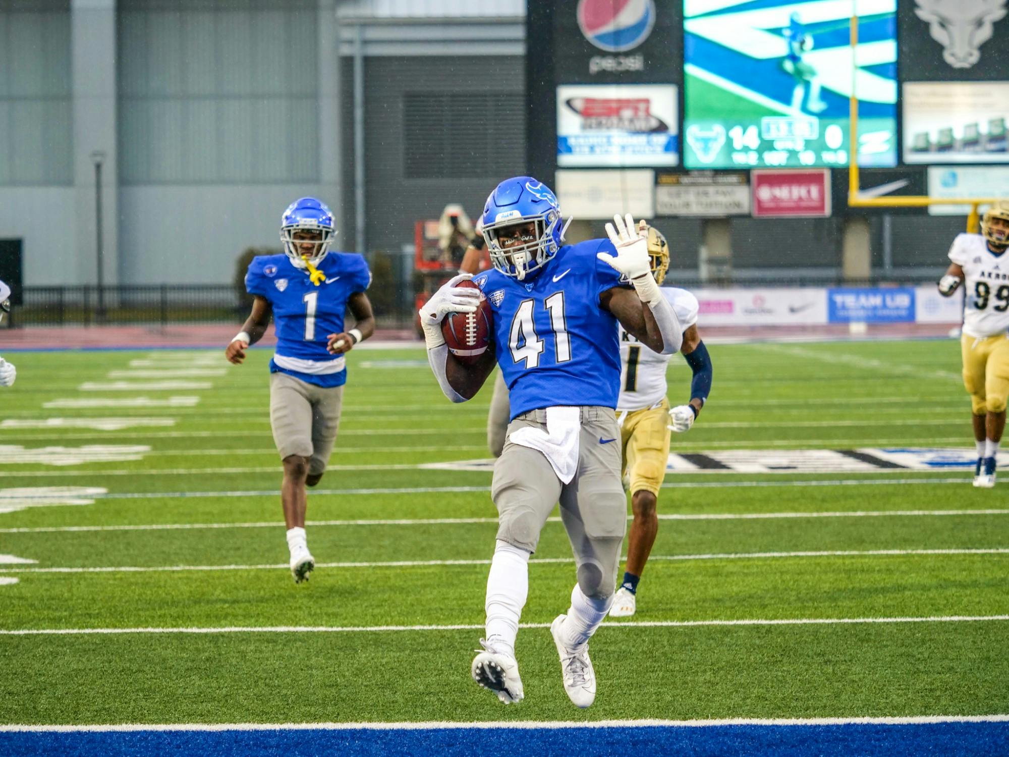 Senior running back Kevin Marks (41) rushes for a touchdown in a 2020 game against Akron.