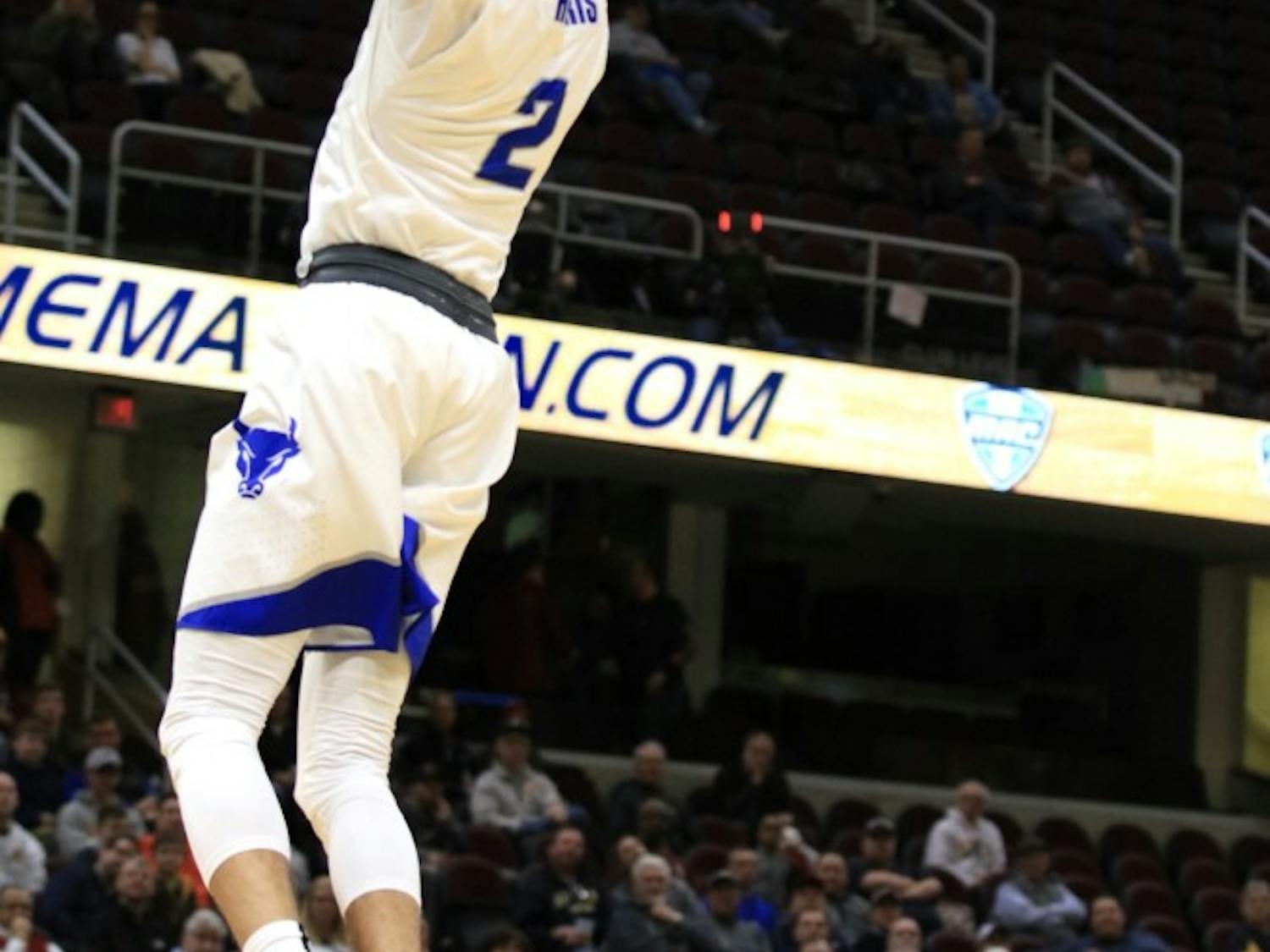 Junior guard Jeremy Harris with the slam dunk at this years MAC Championship. The Bulls lost in the second round of the NCAA tournament on Saturday to the Kentucky Wildcats.