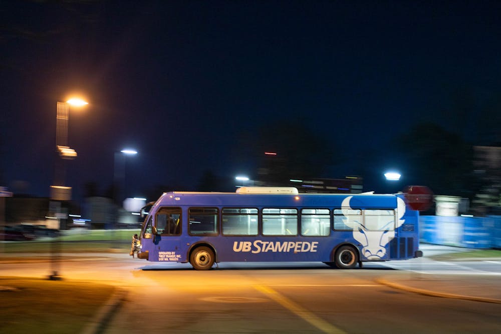 <p>A Stampede bus departs from a South Campus stop. The majority of the fleet is still powered by fossil fuels.</p>