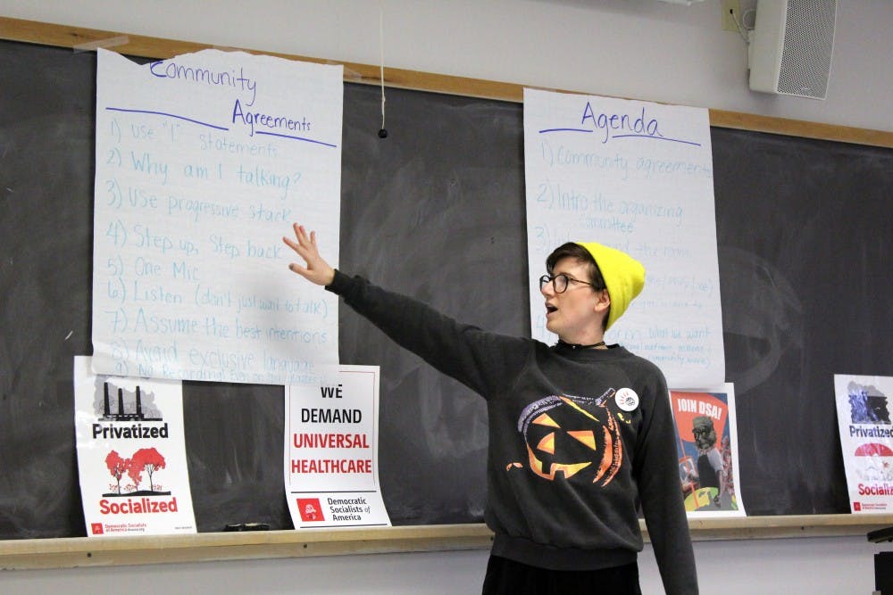 <p>Founding member Laura Kerrigan, a second-year graduate student in American studies, leads the first meeting of the new YDSA chapter. The group's arrival to campus is indicative of a growing interest in socialism nationwide.</p>
