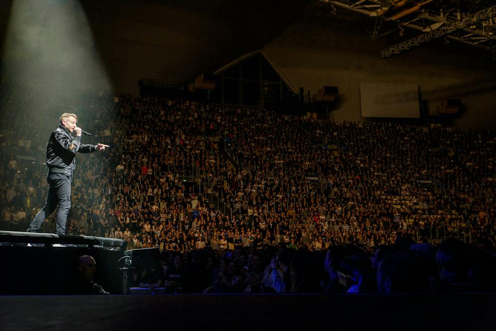 Macklemore plays live with Ryan Lewis on April 7, 2016.
