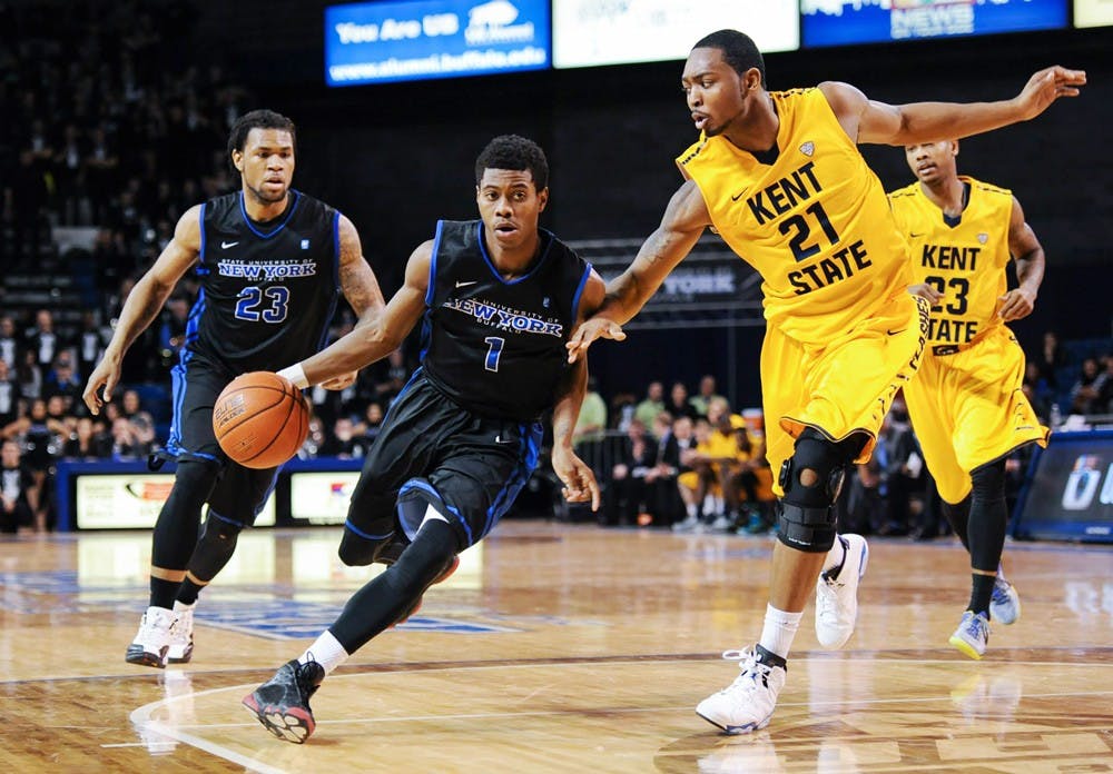 <p>Lamonte Bearden (1) drives with the ball in an 80-55 win over Kent State on Jan. 30. Bearden and other UB freshmen made a strong impact on their teams in the 2014-15 season and figure to make an even greater impact this season. </p>