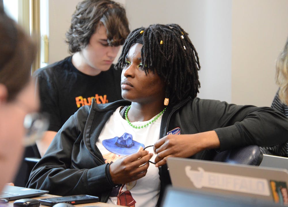 SA President Becky Paul-Odionhin listens during Wednesday's Senate meeting.