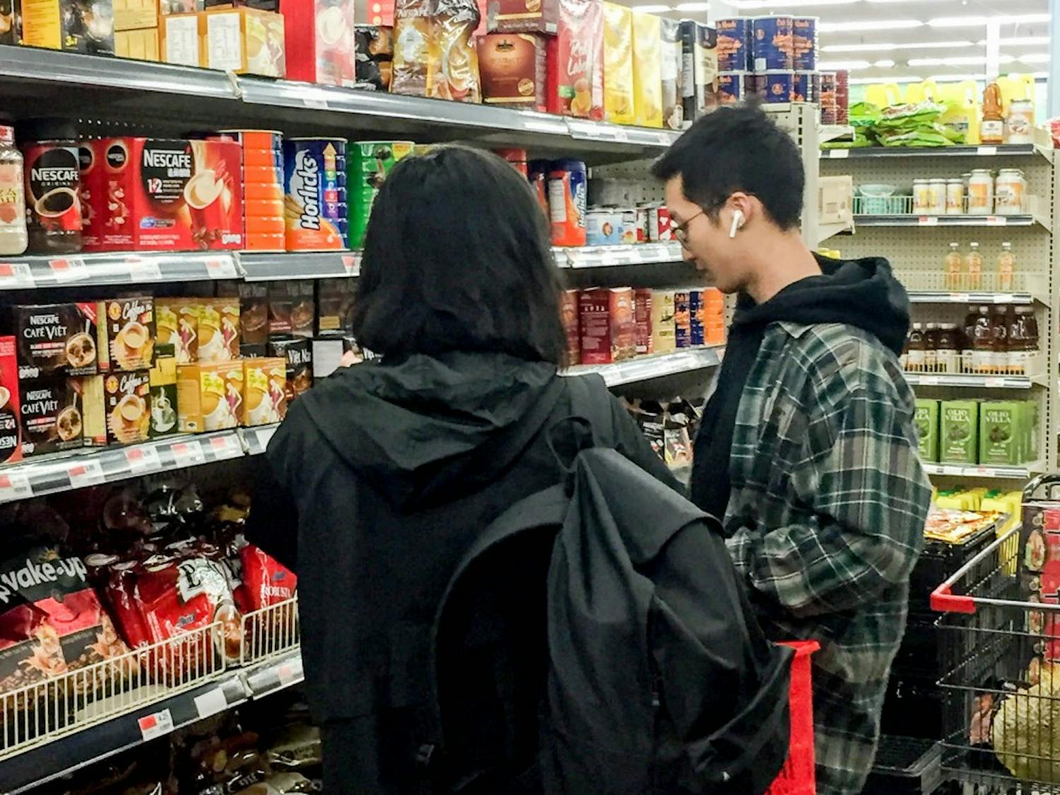 Two students shopping at Asia Food Market. The new market bus brings students to and from the market every Tuesday from 4 p.m. to 8 p.m., and has already transported hundreds of students to the market.