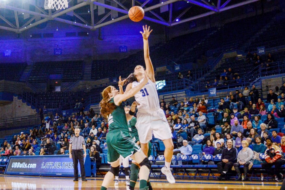 Oursler towers over a Eastern Michigan player in the post. After their last game, head coach Felisha Legette-Jack said Oursler could be a “20-10” player.