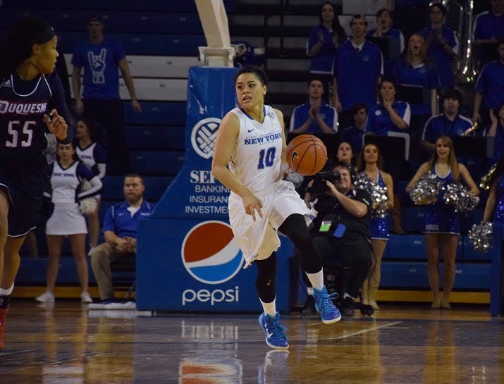 Freshman guard Gabi Bade brings the ball up court in Buffalo's 79-62 loss to Duquesne at Alumni Arena Sunday. Bade scored 16 points.&nbsp;
