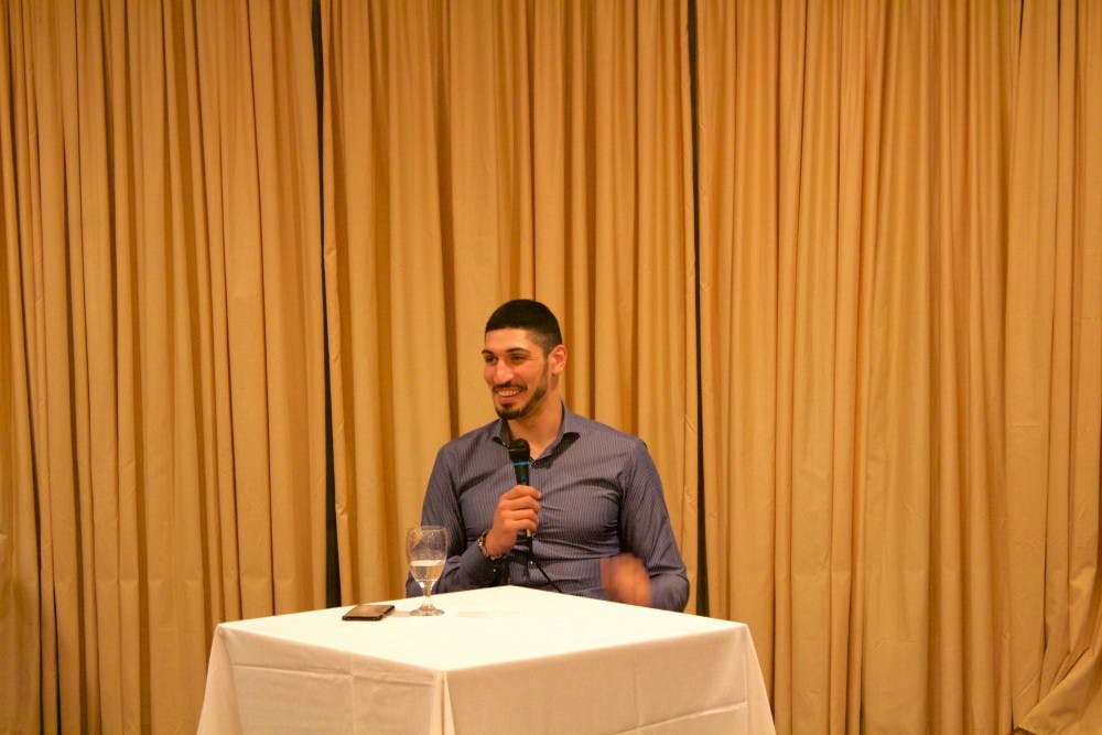 <p>Enes Kanter answers questions from Muslim Student Association members and Muslim community members during the Muslim Students Association Annual Banquet.</p>