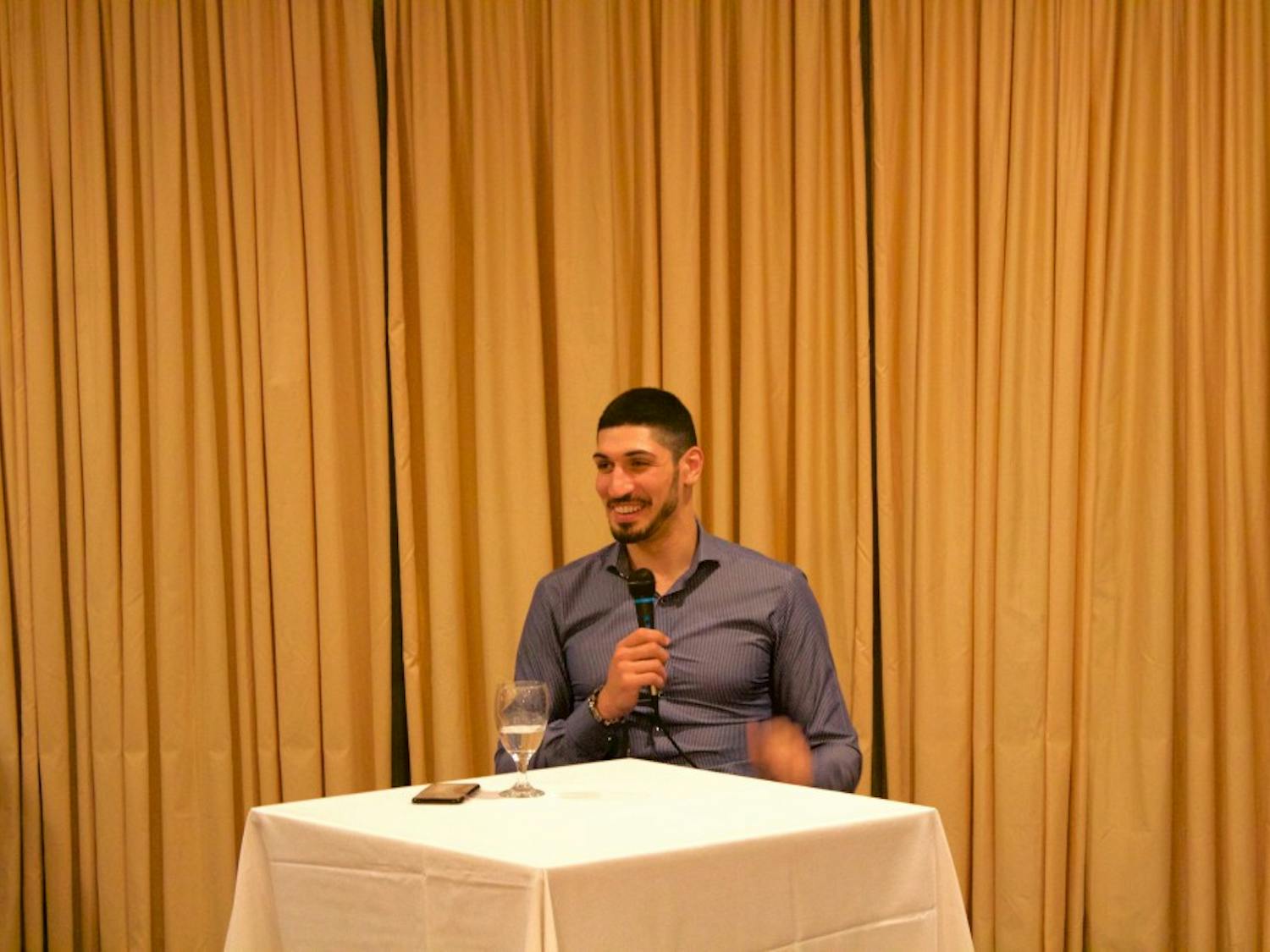 Enes Kanter answers questions from Muslim Student Association members and Muslim community members during the Muslim Students Association Annual Banquet.