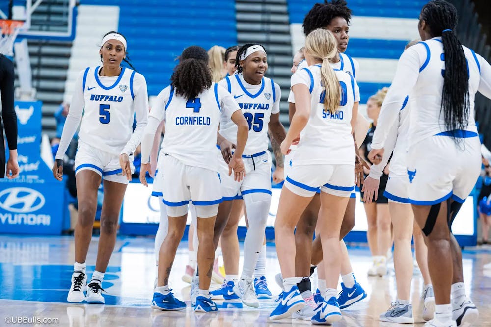 <p>The women's basketball team celebrating another win.</p>