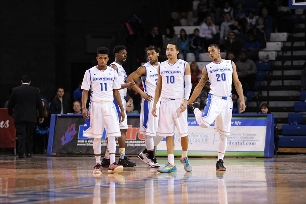 <p>(From left to right) Sophomore guard Shannon Evans, senior forward Xavier Ford, junior forward Justin Moss, junior guard Jarryn Skeete and junior forward Rodell Wigginton during a timeout in Buffalo's 77-68 victory over Miami Ohio on Jan. 17. They will lead the Bulls into the MAC Semifinals on Friday after securing a triple-bye.</p>