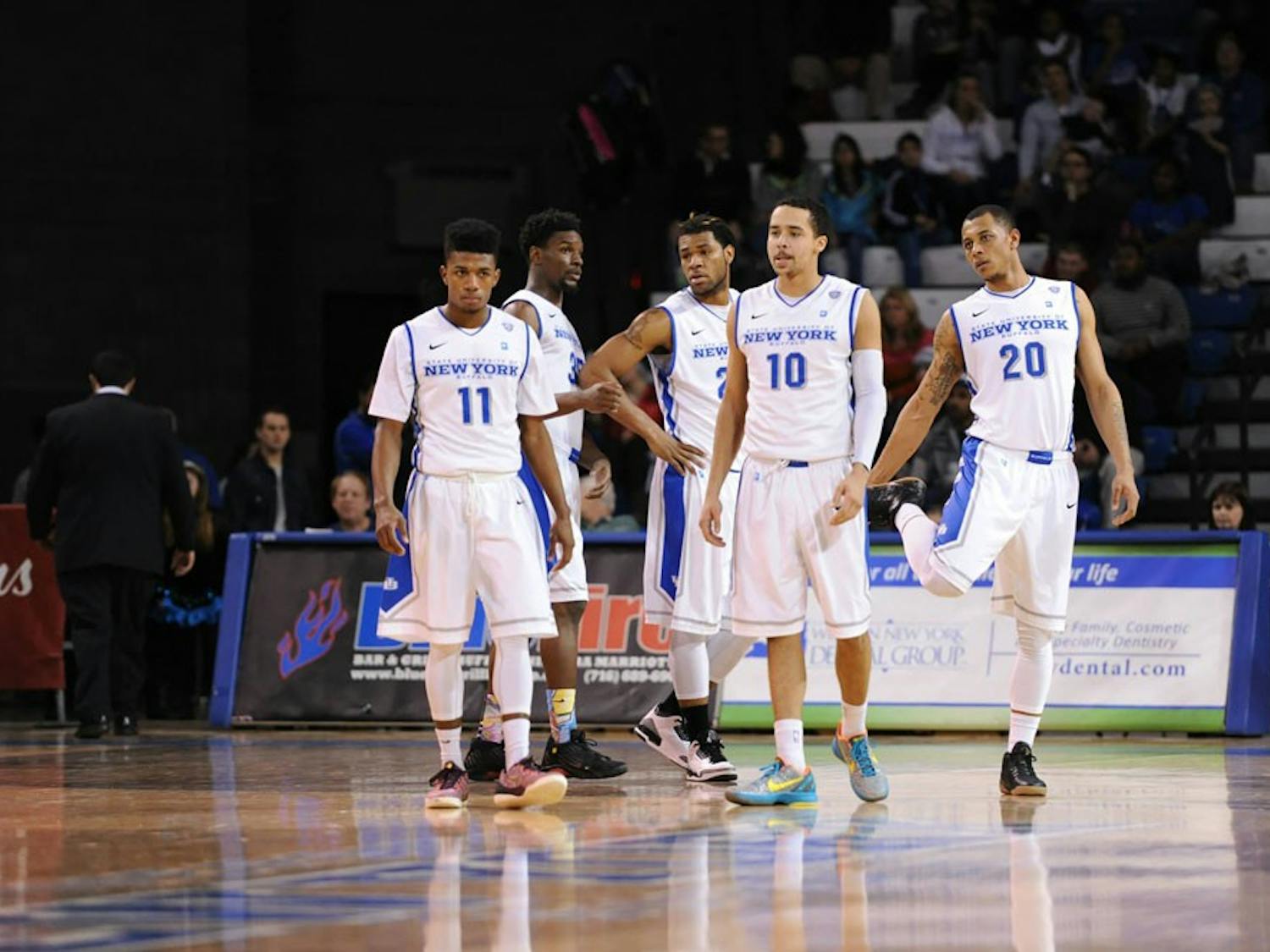 (From left to right) Sophomore guard Shannon Evans, senior forward Xavier Ford, junior forward Justin Moss, junior guard Jarryn Skeete and junior forward Rodell Wigginton during a timeout in Buffalo's 77-68 victory over Miami Ohio on Jan. 17. They will lead the Bulls into the MAC Semifinals on Friday after securing a triple-bye.