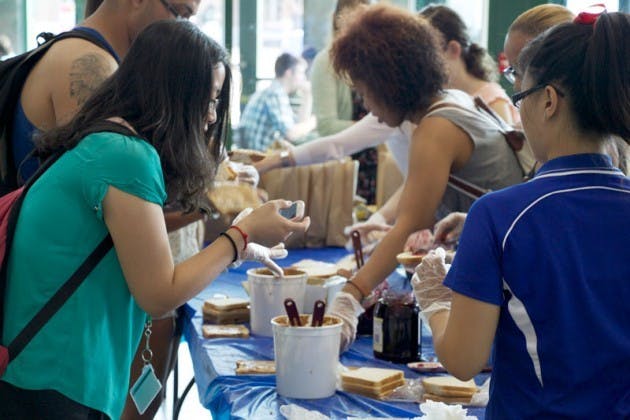 Students prepare sandwiches for the Buffalo City Mission in 2013.&nbsp;For the past three years, the Center for Student Leadership &amp; Community Engagement has hosted a 9/11 service day. Chad Cooper, The Spectrum