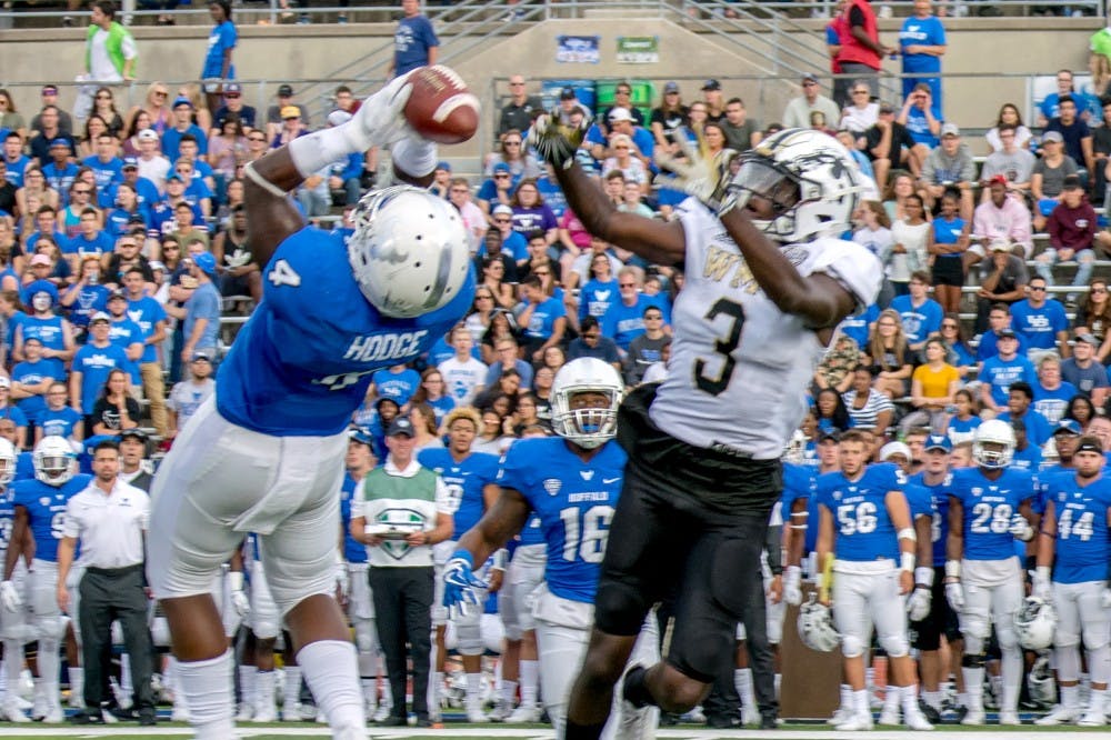 <p>Junior linebacker Khalil Hodge comes down with an interception in the first quarter. Hodge finished Saturday with 18 tackles and ranks second in the nation in tackles per game.</p>