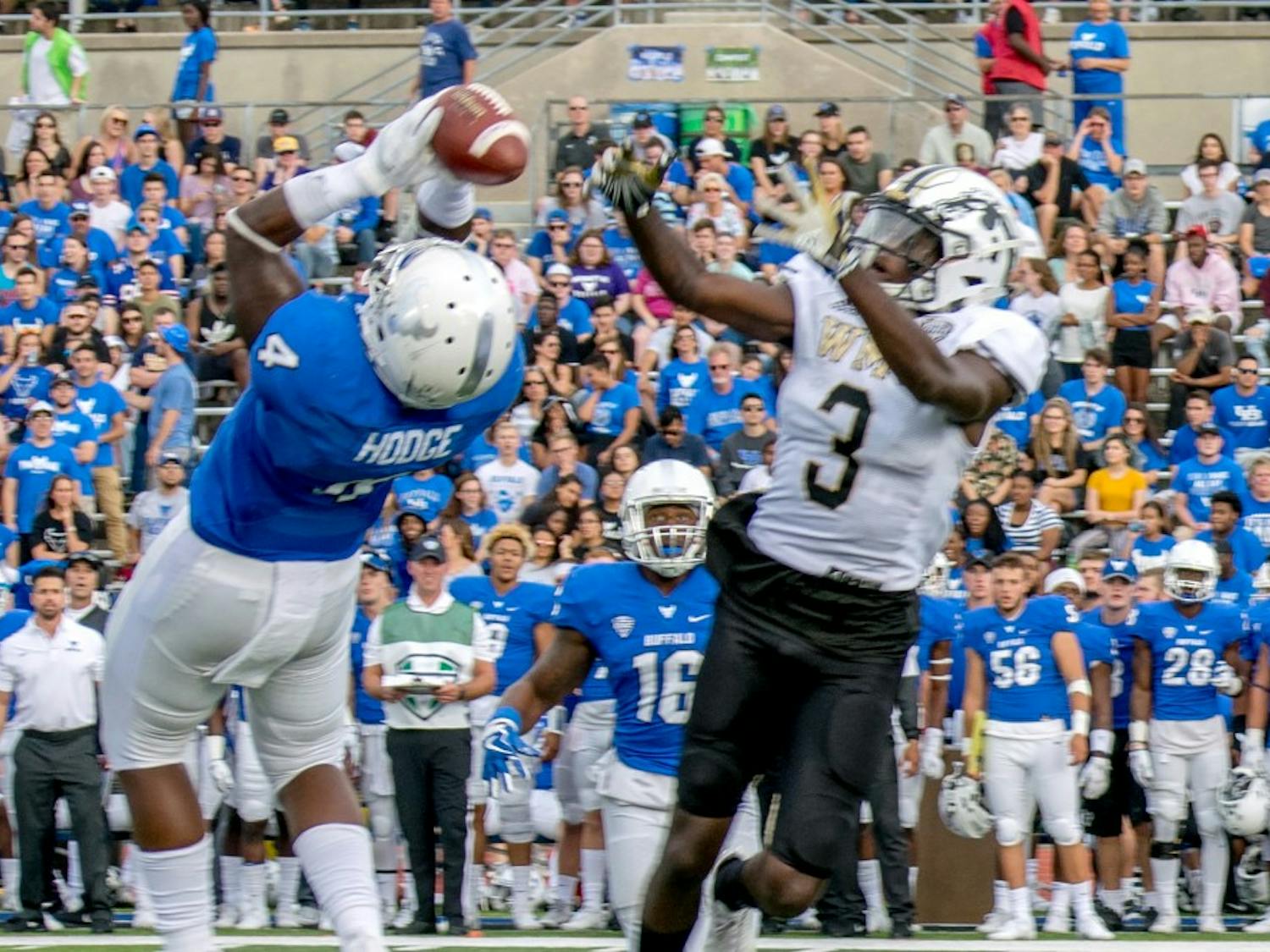 Junior linebacker Khalil Hodge comes down with an interception in the first quarter. Hodge finished Saturday with 18 tackles and ranks second in the nation in tackles per game.