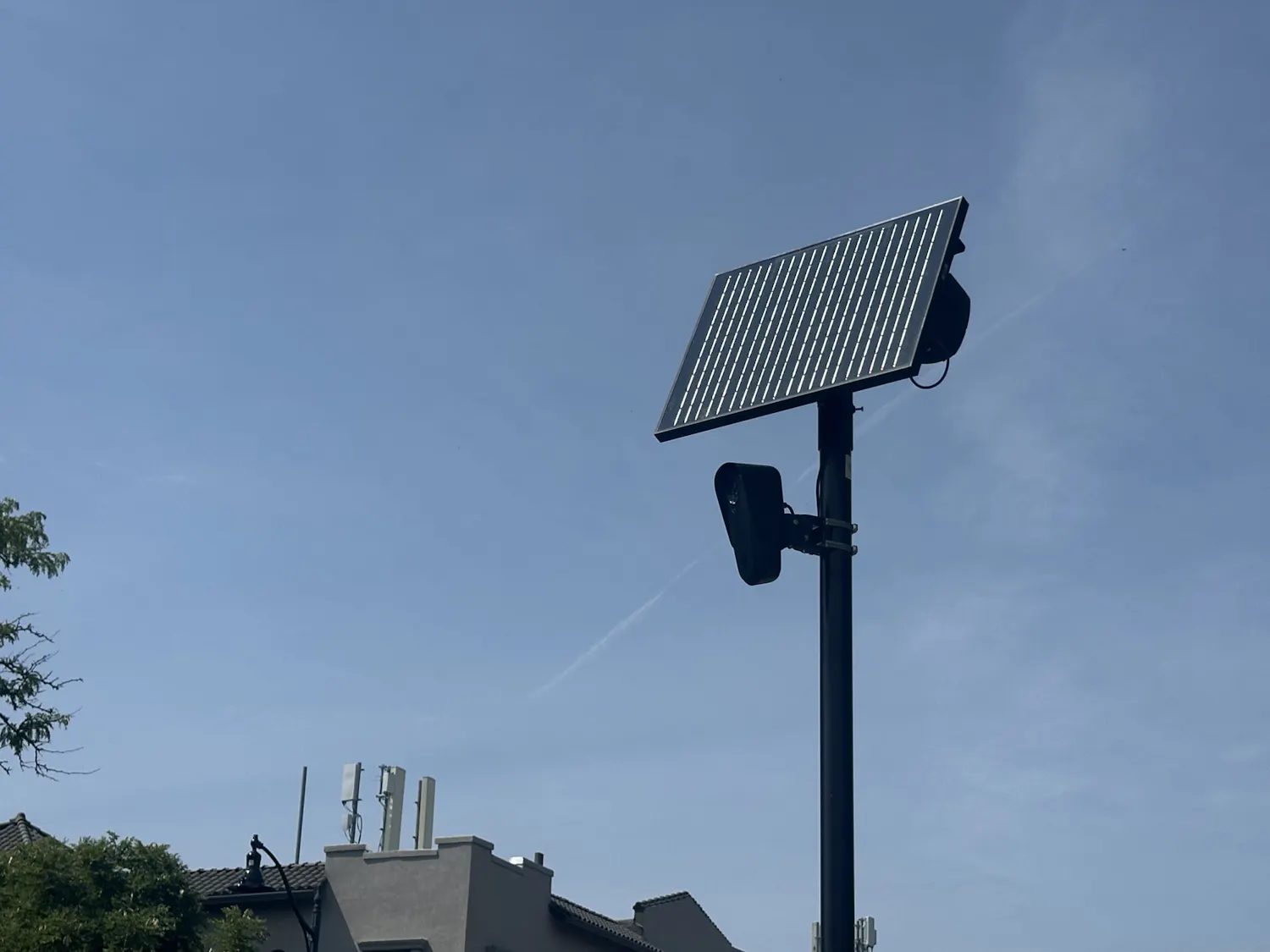 A photo of a Flock camera run by the Niagara Transportation Frontier Authority at a park-and-ride lot near University Station.