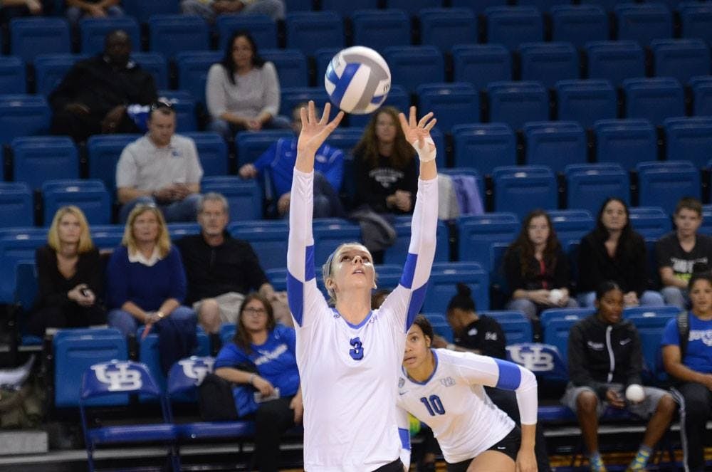 <p>Junior setter Madison Clark sets the volleyball in a home game. Clark has decided to transfer out of UB women's volleyball program.&nbsp;</p>
