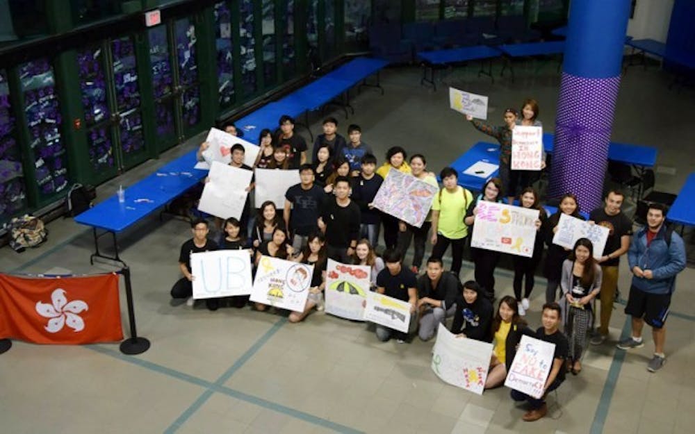Hong Kong students gathered in the Student Union on Oct. 1 to make posters in support of the ongoing pro-democratic protests.
Courtesy Johnathon Lau