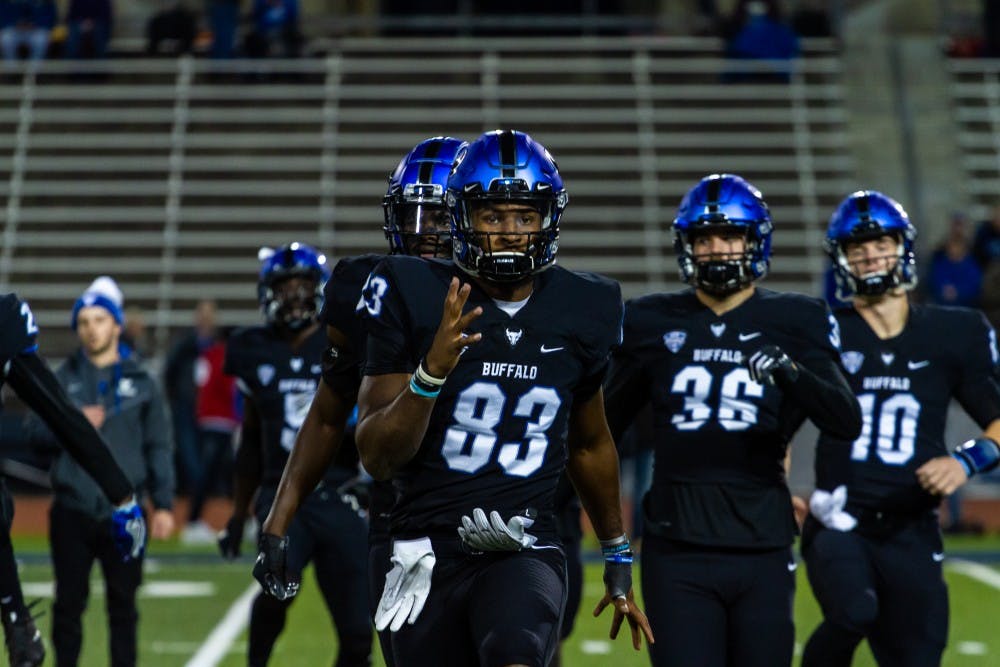 <p>Senior wide receiver Anthony Johnson walks off the field. Johnson broke a 37-year-old record Tuesday night with 238 receiving yards on 8 catches.</p>