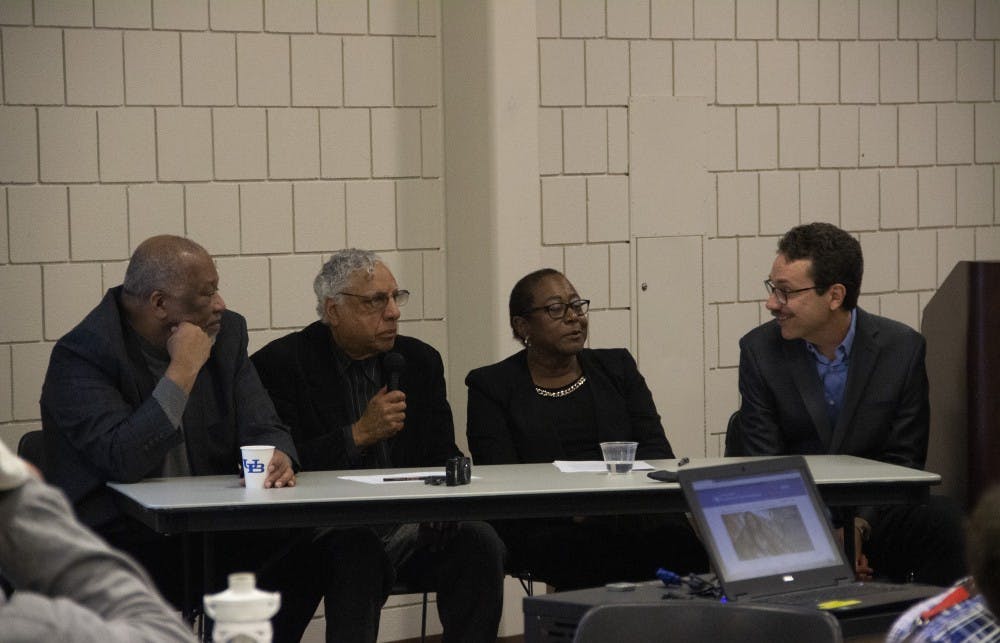 <p>(left to right) Cecil Foster, James Pappas, Lillian Williams and Keith Griffler spoke during the AAS 50th-year celebration. The panelists discussed the program’s history at UB.</p>