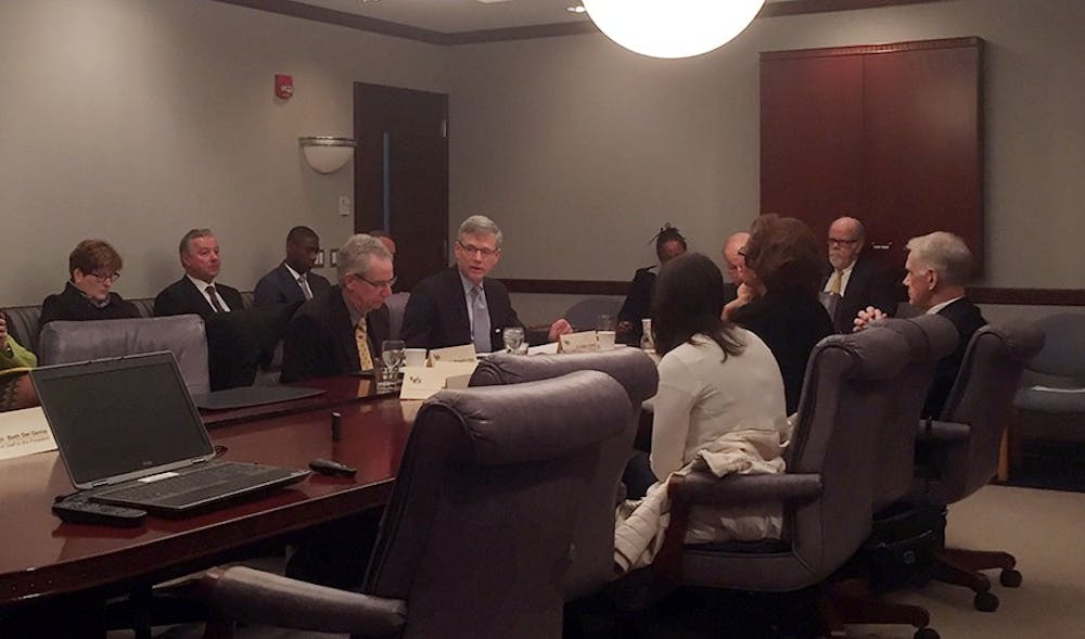 <p>Attendees at Monday’s UB Council meeting discuss ongoing cancer research and NYSUNY&nbsp;2020.</p>