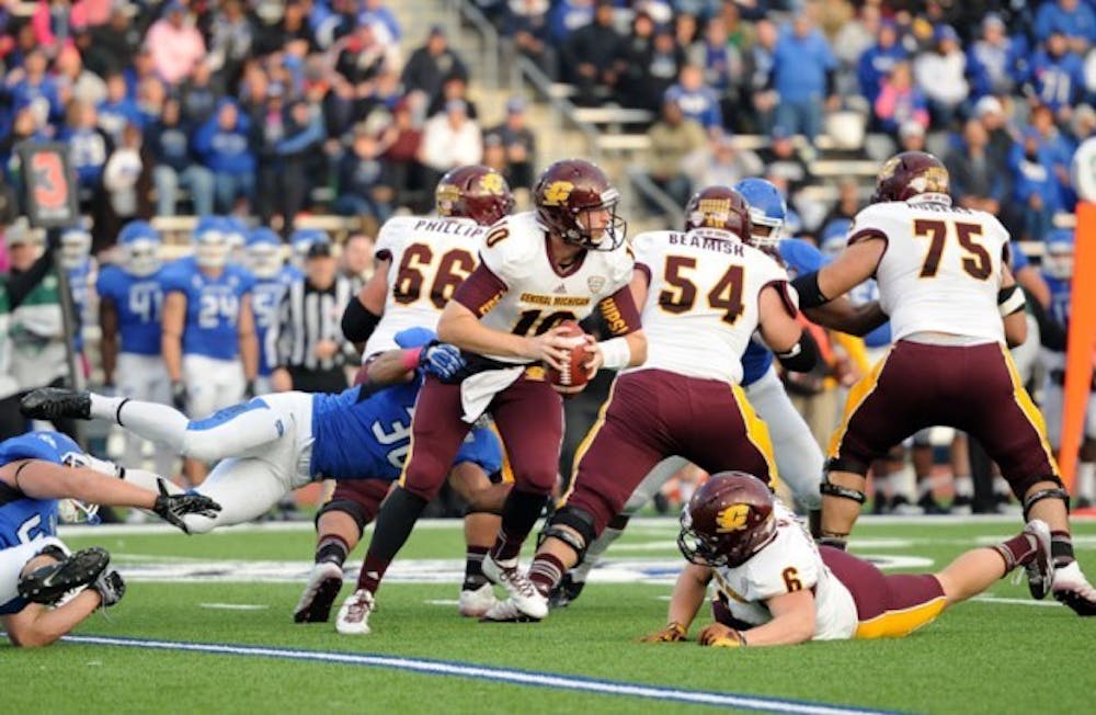 Sophomore linebacker Jarrett Franklin sacks Central Michigan quarterback in the third quarter of Buffalo&rsquo;s 20-14 loss Saturday. The Bulls had a season-high five sacks Saturday.&nbsp;Yusong Shi, The Spectrum