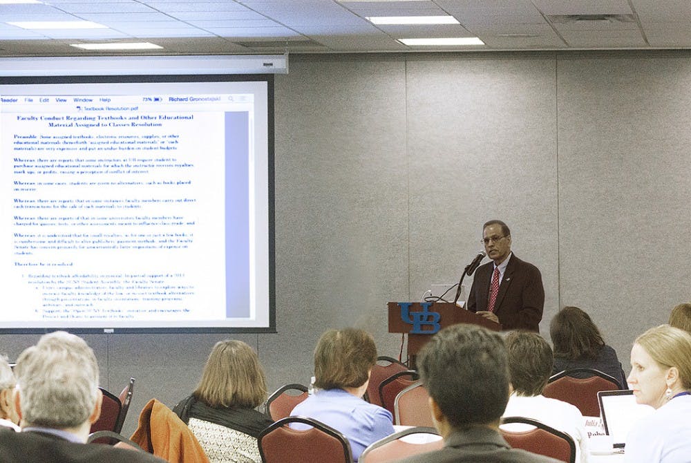 <p>President Satish Tripathi speaks at the first Faculty Senate meeting of the year. The Senate passed a resolution that regulates professors assigning their own textbooks to classes.</p>