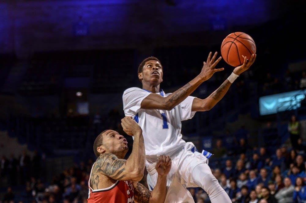 <p>Sophomore guard Lamonte Bearden drives for a layup in a victory over Ball State at Alumni Arena. Bearden had a team-high 23 points in a 90-78 victory over Northern Illinois Tuesday night.&nbsp;</p>