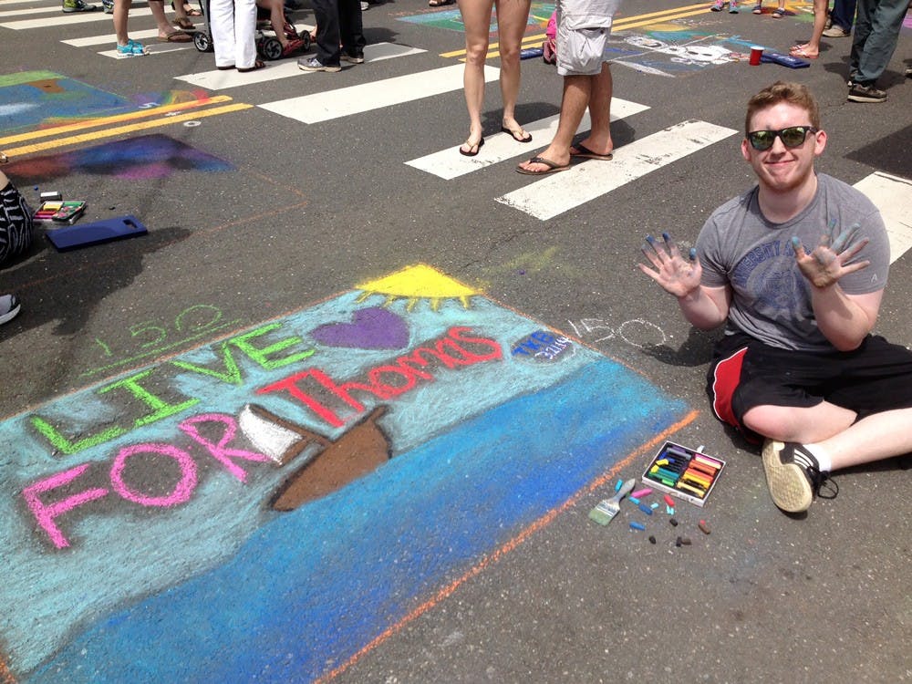 <p>Over the summer, my cousins and I made a chalk mural in honor of Thomas at the Riverhead Arts Festival.</p>