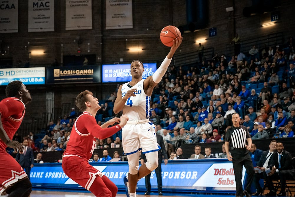 <p>Senior guard Davonta Jordan driving to the basket for 2 of his 11 points.</p>