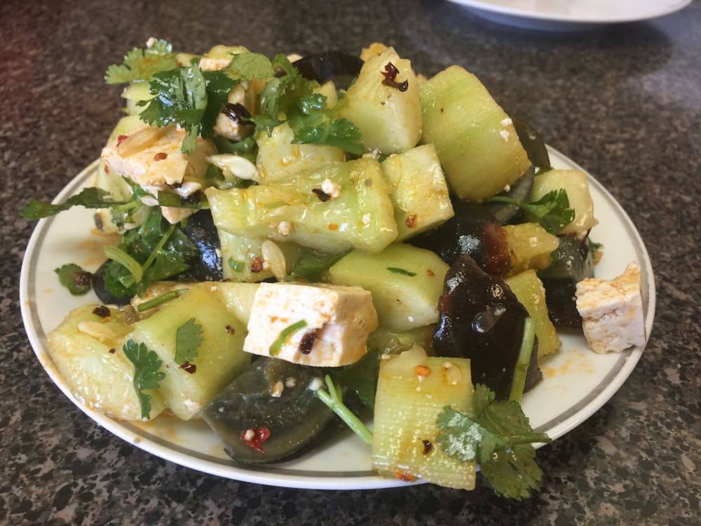 Thousand-year egg, tofu, cucumber and cilantro make for a healthy salad.