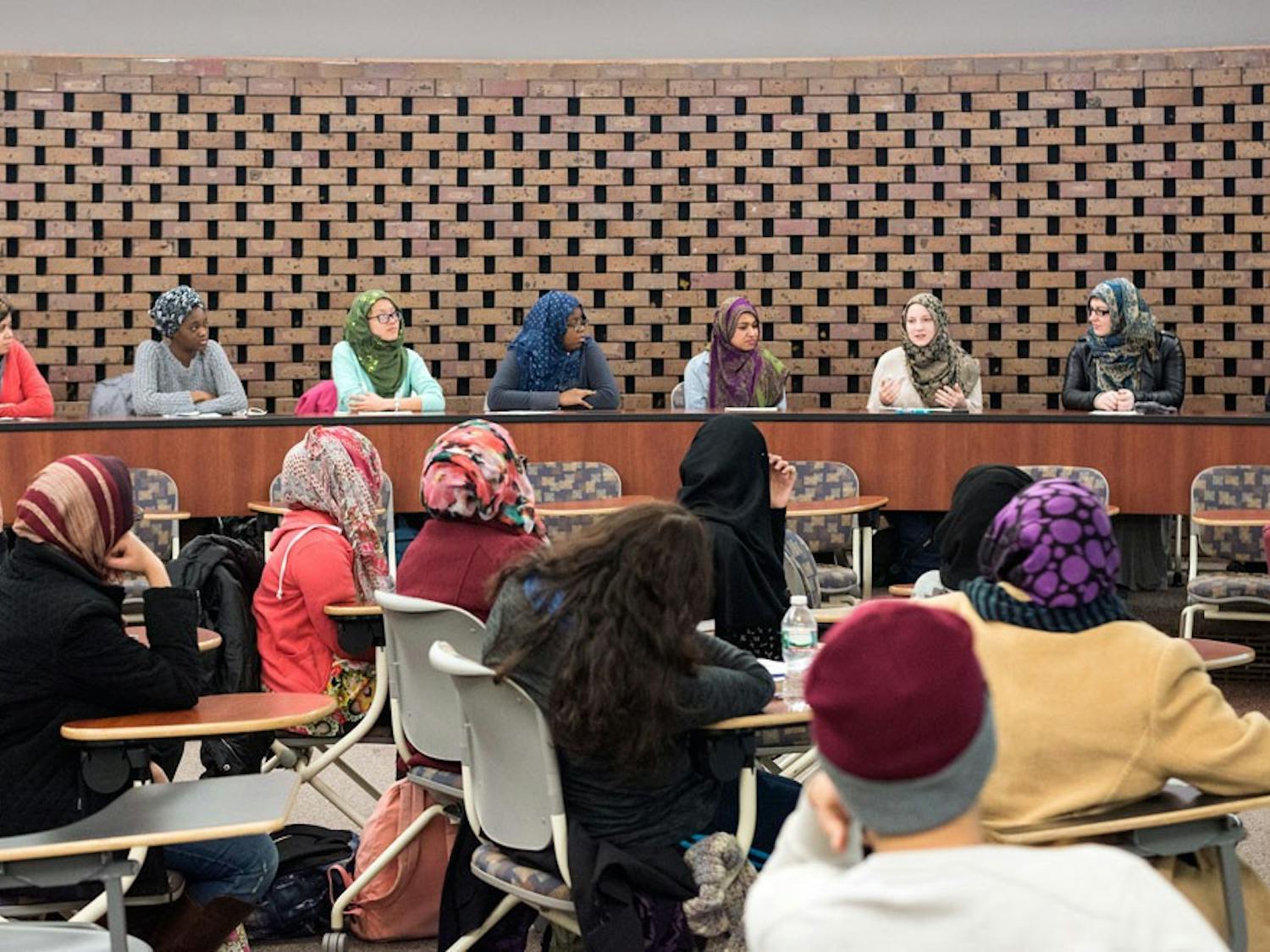 During a discussion session after the daylong “Cover a Mile in Her Scarf” event, Muslim and non-Muslim students talked about perceptions on wearing a hijab on Feb. 20. Non-Muslim students spent the day wearing a hijab, discovering what daily life is like for hijabis (Muslim women who choose to wear a hijab).