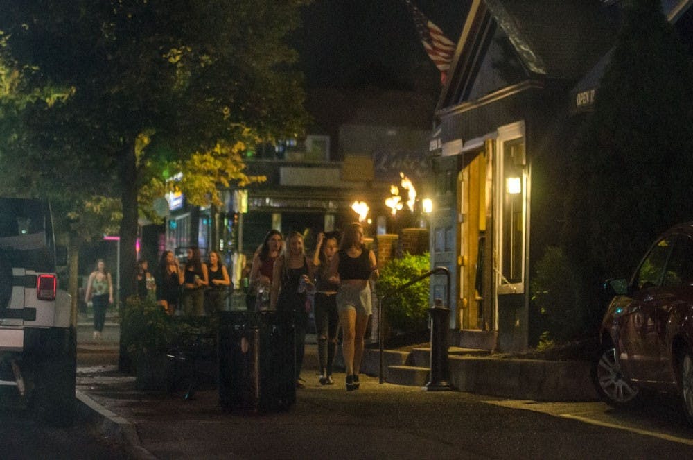 <p>Some bar-goers head into The Steer in the University Heights Thursday night. Erie County legislators are proposing the county change bar closing times to 2 a.m. instead of 4 a.m.</p>