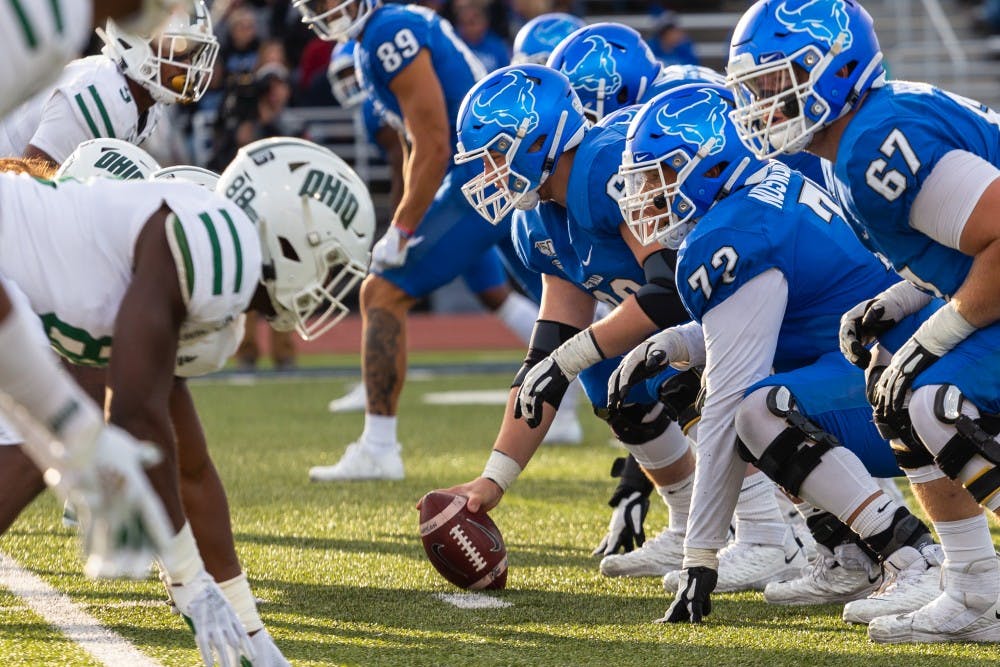 The Bulls line up against the Ohio Bobcats during the homecoming game Saturday.