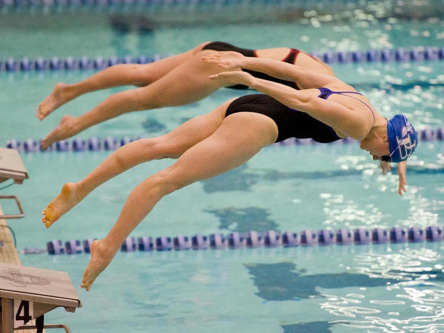 A UB swimmer dives into the pool. UB Athletics had many big moments in February.