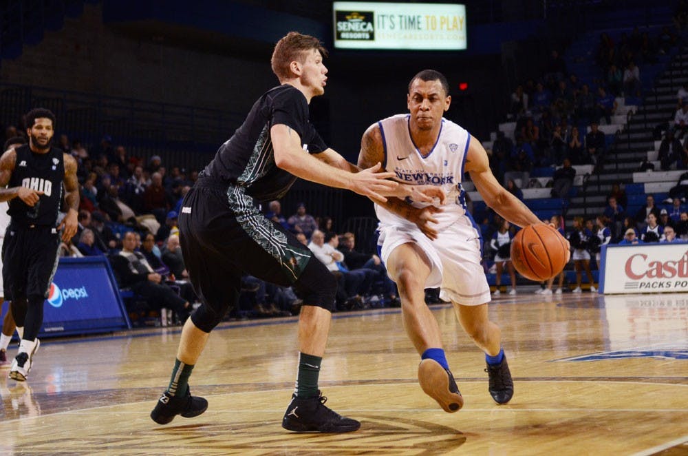 <p>Junior guard Rodell Wigginton drives to the basket against Ohio in Buffalo's 93-66 win Tuesday night. Wigginton had a career-high 20 points. </p>