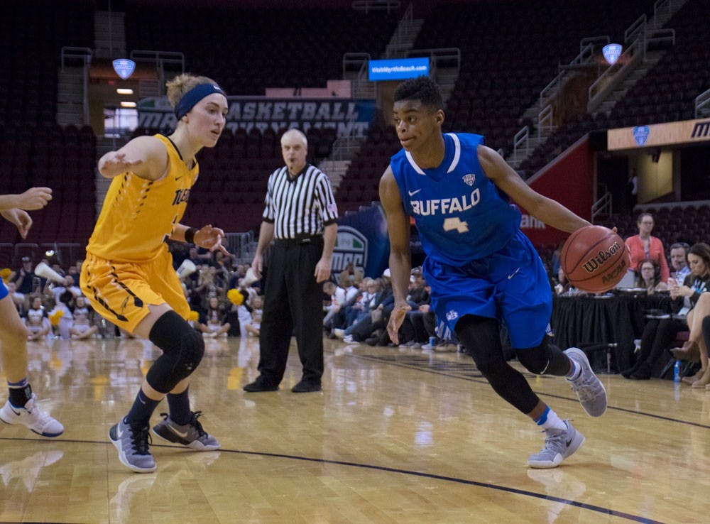 <p>Senior guard JoAnna Smith drives to the hoop during the MAC Tournament semifinal against Toledo. Women’s basketball failed to repeat as MAC Champions.</p>