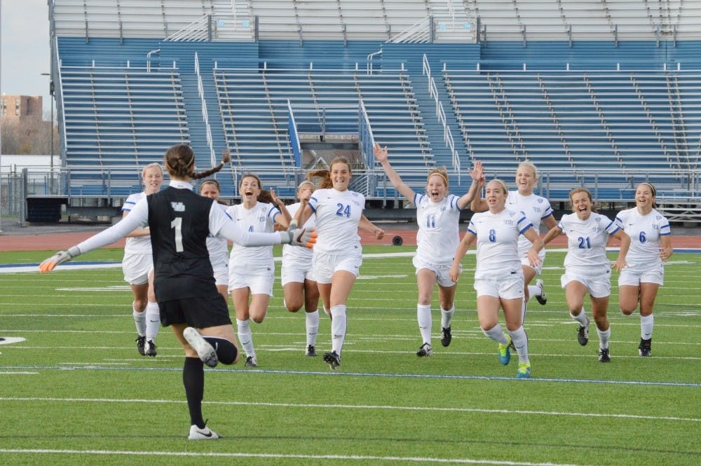 <p>The women's soccer team rushes to celebrate with sophomore goalkeeper Laura Dougall (1) after the Bulls defeated Central Michigan&nbsp;to advance to the Mid-American Conference Tournament Semifinals last season. The Bulls announced their 2016 recruiting class Thursday.&nbsp;</p>