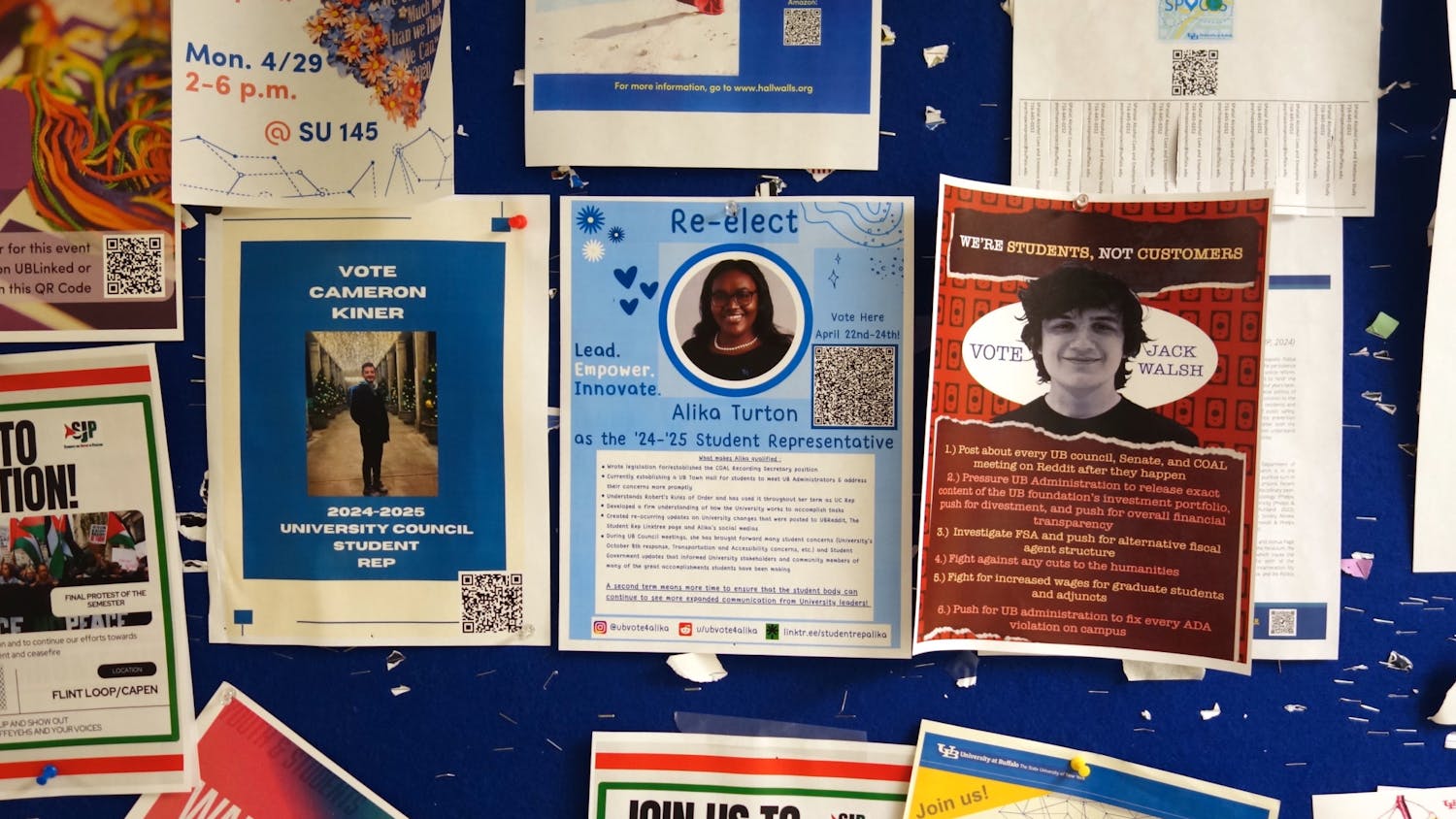 Flyers posted in the Student Union promote the three candidates for UB Council Student Representative.