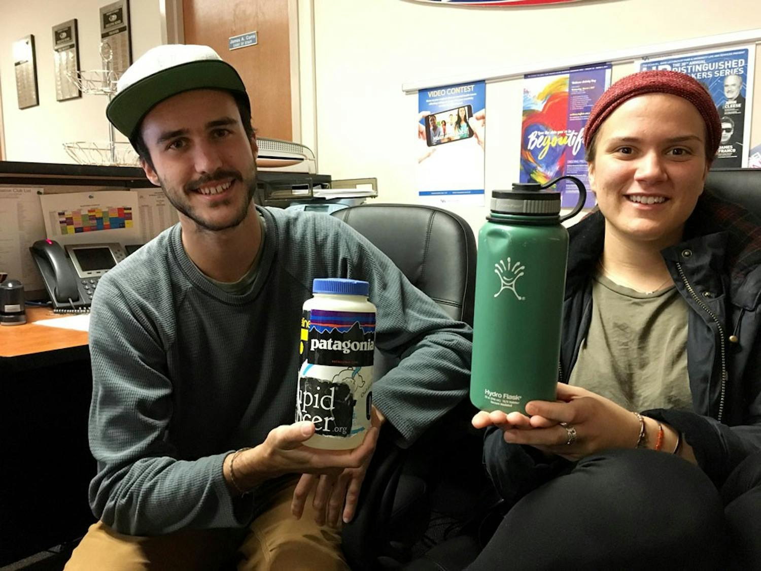 Brian Johnson and Anna Heintzman are members of UB’s Outdoor Adventure Club. Johnson and Heintzman take pride in personalizing their reusable water bottles.