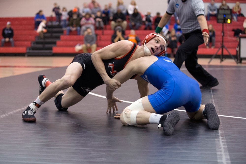 <p>Buffalo's Sean Peacock wrestles Northern Illinois' Jordan Northrup in the 133-pound match in the Bulls' 26-10 loss Friday night. </p>