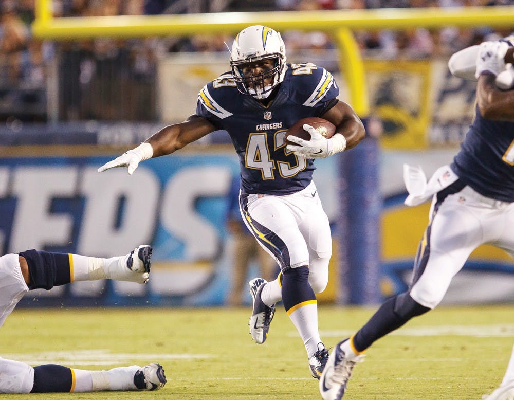 <p>Branden Oliver runs the ball for a touchdown earlier this season for&nbsp;the San Diego Chargers. The former UB running back has been successful in the NFL.</p>