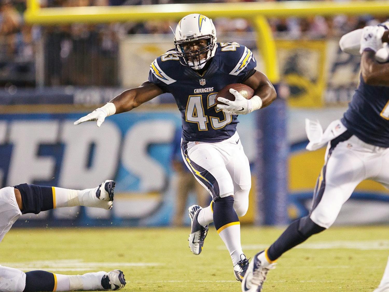 Branden Oliver runs the ball for a touchdown earlier this season for&nbsp;the San Diego Chargers. The former UB running back has been successful in the NFL.