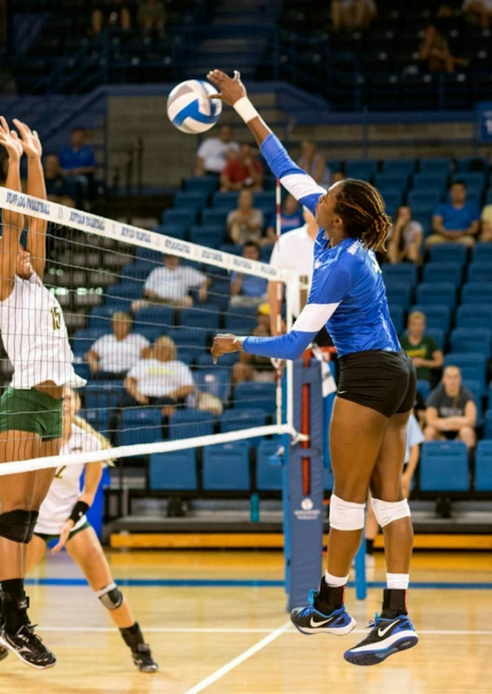 Junior middle blocker Amber Hatchett and the volleyball team won the USF Invite this weekend.
Wenyi Yang, The Spectrum