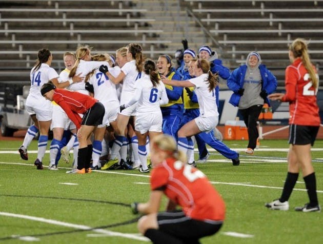 The Bulls celebrate their first trip to the MAC championship game in program history.&nbsp;
Yusong Shi, The Spectrum